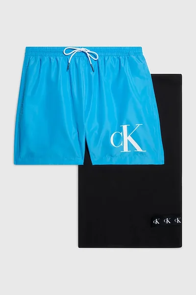 Dárkové balení pánských plavek a ručníku s logem Calvin Klein v modro-černém provedení