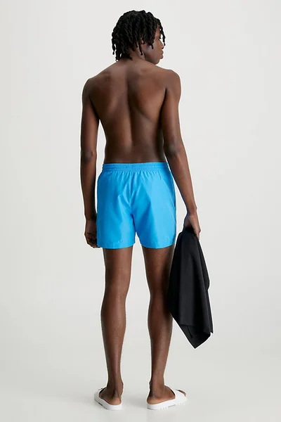 Dárkové balení pánských plavek a ručníku s logem Calvin Klein v modro-černém provedení