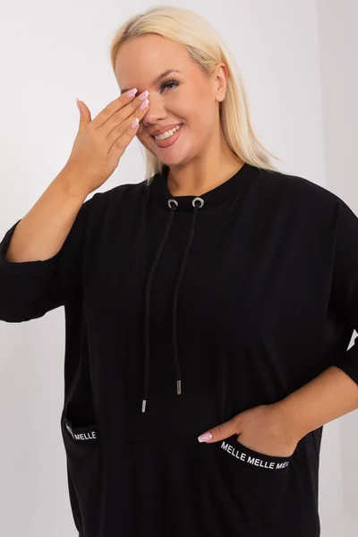 Volná černá dámská halenka s kapsami - Fashionhunters