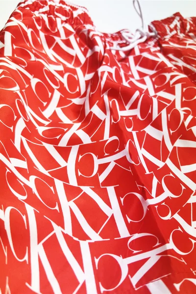 Pánské plavky CK s potiskem v červenobílé barvě