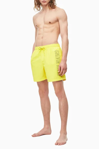 Pánské plavecké šortky 95Z71C žlutá - Calvin Klein