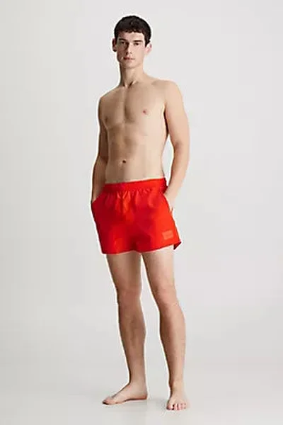 Pánské červené plavky SHORT DRAWSTRING  Calvin Klein