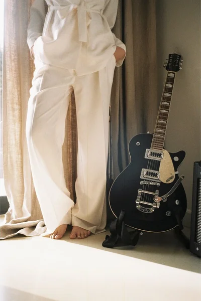 Krémové široké kalhoty s ozdobnými knoflíky od značky BE