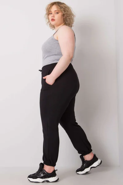 Černé dámské tepláky Plus Size FPrice