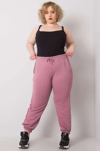 Pudrově růžové dámské tepláky Plus Size FPrice